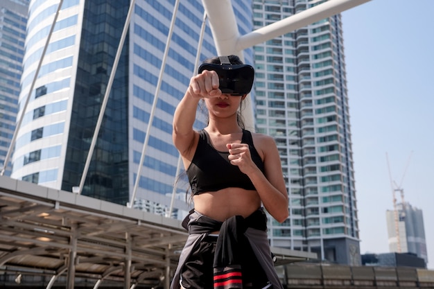 Sport woman with VR glasses 