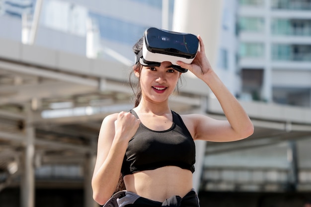 Sport woman with VR glasses 