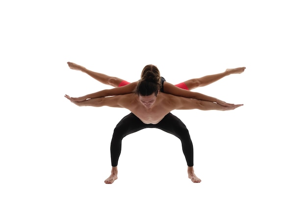 Sport yoga couple isolated on white sport yoga couple in studio sport yoga couple