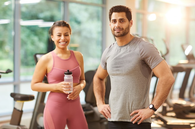 Sportive Couple Posing in Gym