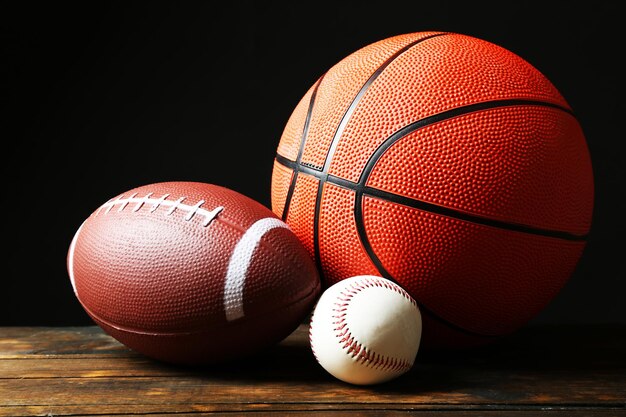 Photo sports balls on black background