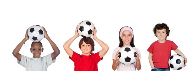 Sports for children. Group of joyful boys and a girls engaged in sports posing together. Education. Isolated over white background.