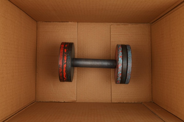 Sports dumbbell in a box