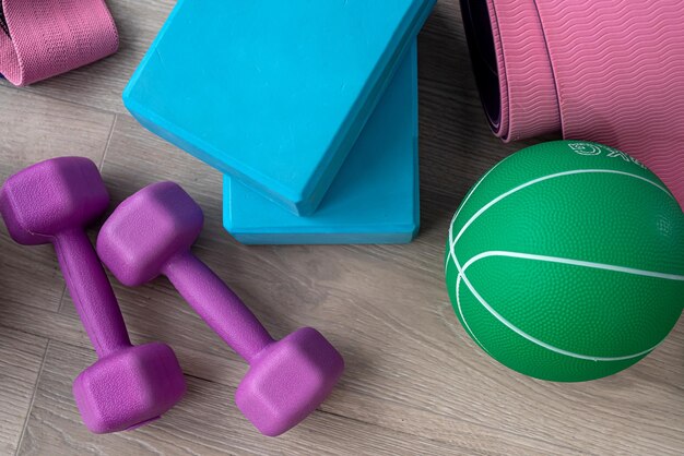 Sports equipment among which the ball dumbbells rubber mats are laid out for sports