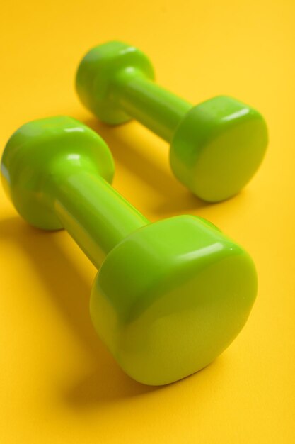 Sports equipment in close up Barbells made of plastic