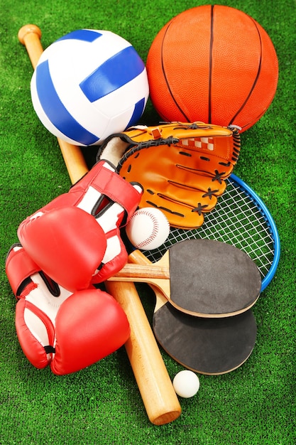 Sports equipment on grass background