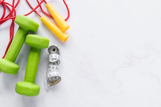 Photo sports equipment lying on white background