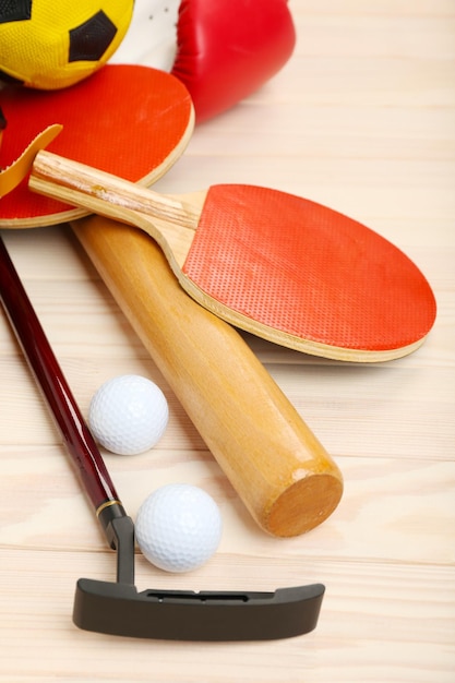 Sports equipment on wooden background