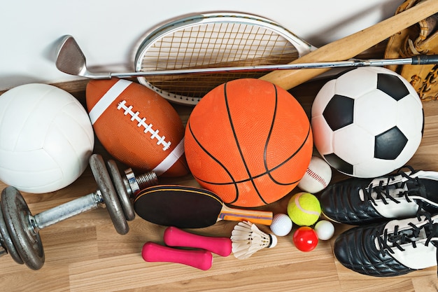 Sports Equipment on wooden background