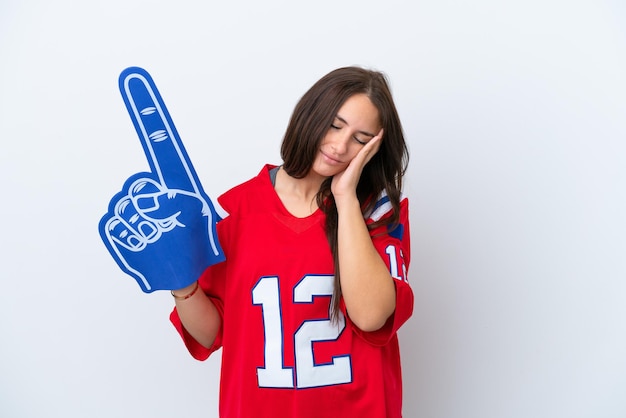 Sports fan Ukrainian woman isolated on white background with headache