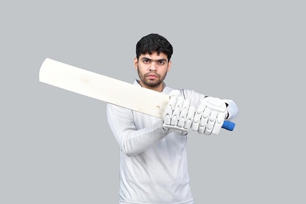 Photo sports man posing cricket shot indian pakistani model