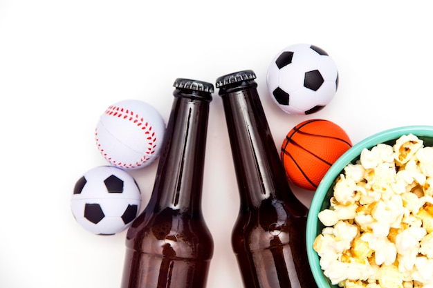 Sports match party Beer bottle with football basketball baseball balls