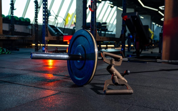 Sports objects on the floor close up view of gym equipment in\
modern gym