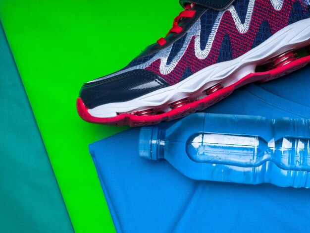 Sports runner shoe and a bottle of water