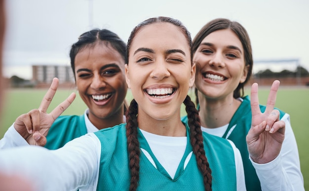 Photo sports selfie girl team and peace sign on field for memory competition and portrait for fitness women group photography and wink on social network with emoji v icon and diversity for hockey game