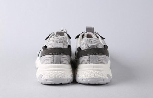Sports shoes on gray background