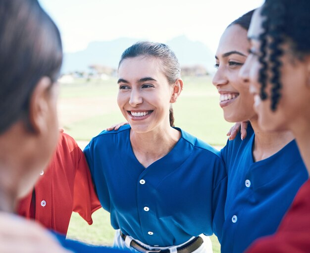 Photo sports team baseball or friends in huddle for fitness competition or game teamwork happy and group of women on a softball field for planning training and communication or funny conversation