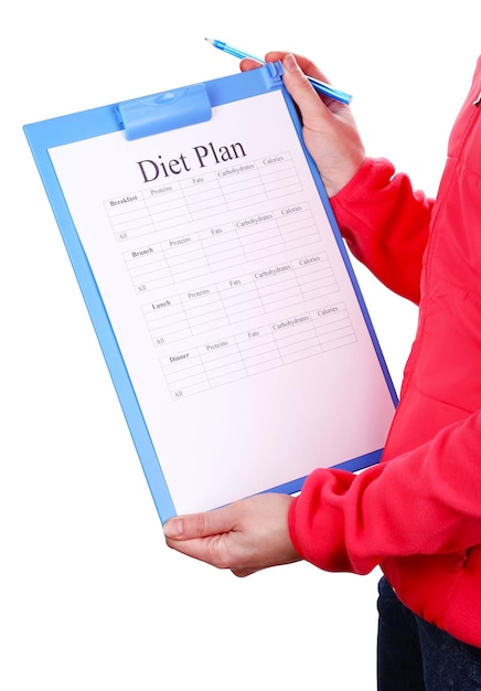 Sports trainer with diet plan isolated on white