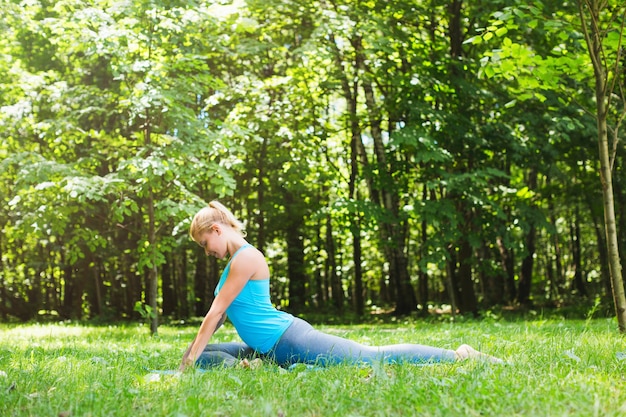 Sports woman doing yoga on outdoor