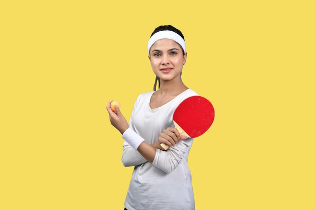 sports women smiling and posing with table tennis indian pakistani model