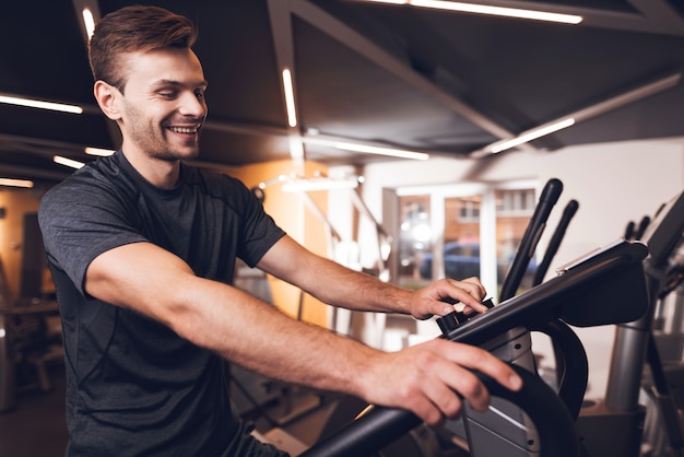 Sportsman Is Doing Exercises With Walking Trainer.