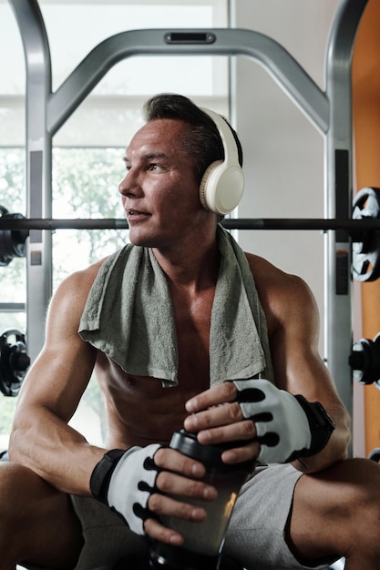 Sportsman Listening to Music