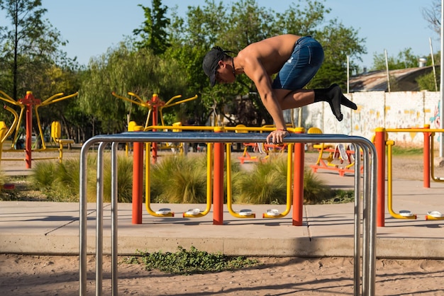 sportswoman doing outdoor gymnastics, athlete, calisthenics