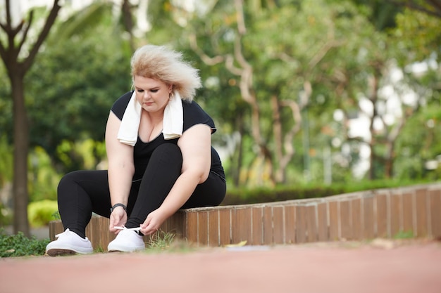 Sportswoman Getting Ready for Jog