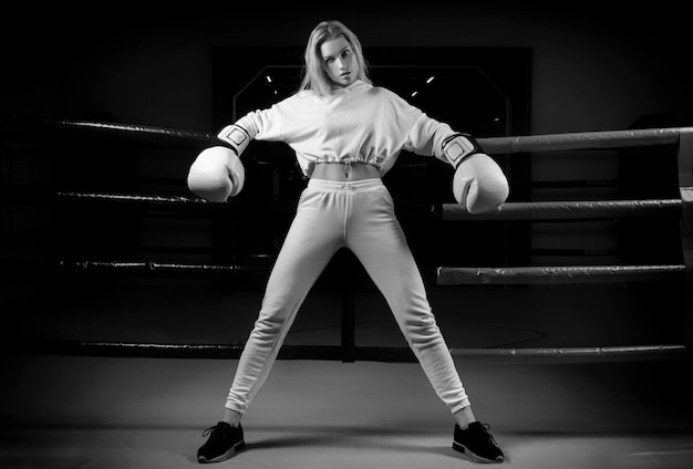 Sportswoman posing in her equipment