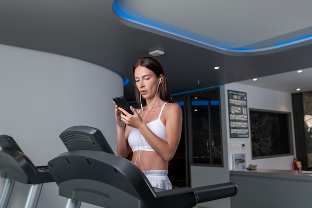 Sportswoman working out on a treadmill