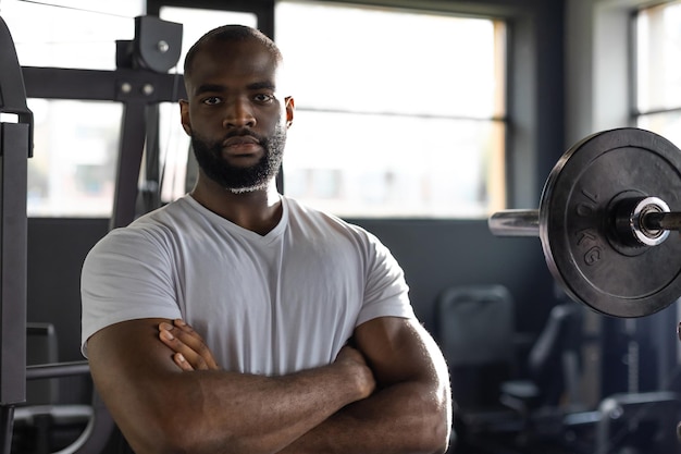 Sporty african man resting having break after doing exercise