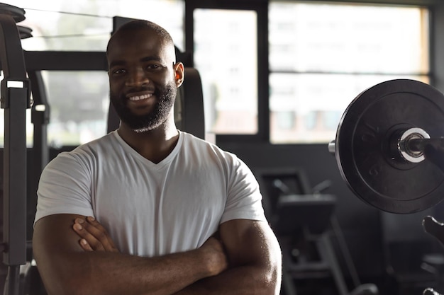 Sporty african man resting having break after doing exercise