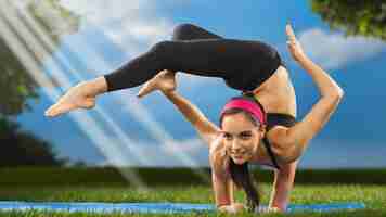 Photo sporty beautiful young woman doing headstand