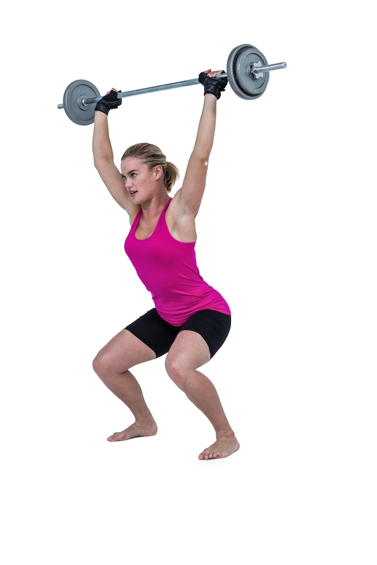 Photo sporty female bodybuilder lifting barebell 
