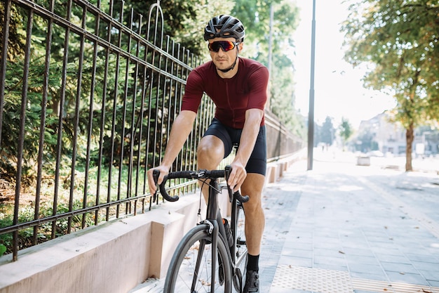 Sporty man in helmet spending time for outdoors training