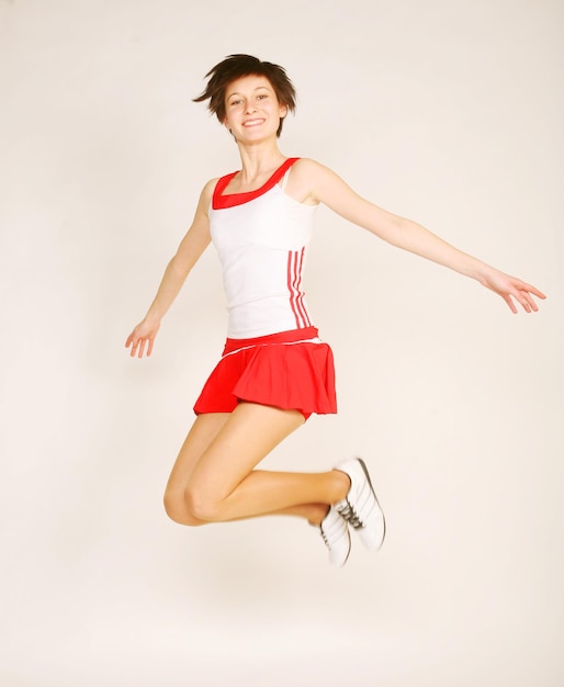 Sporty woman isolated on white background