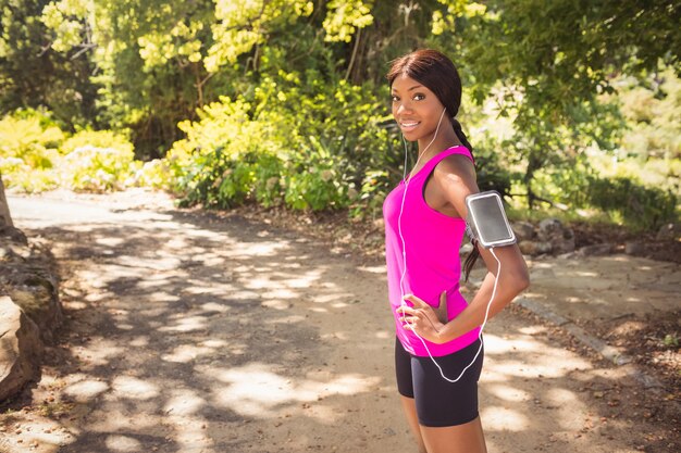 Sporty woman posing alone