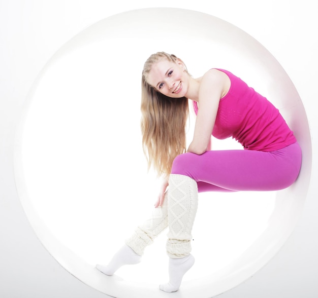 Sporty woman posing in circle