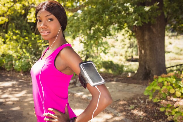 Sporty woman smiling and posing