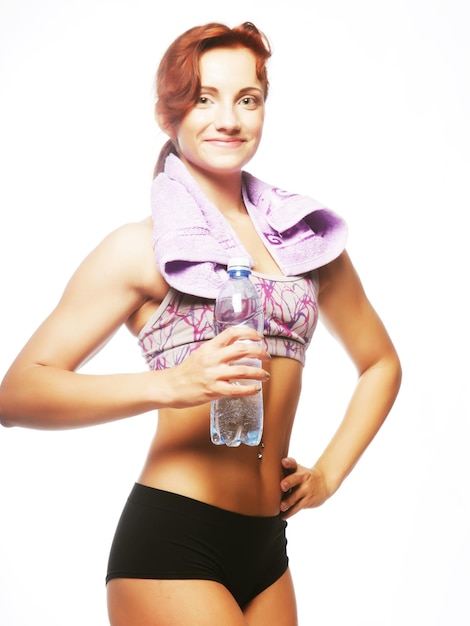 Sporty woman with mineral water