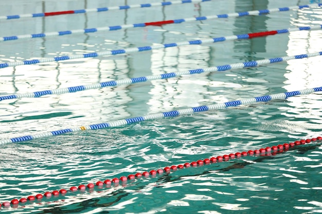 Sporty young man swimming in the pool