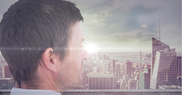 Photo spot of light over caucasian businessman against cityscape in background