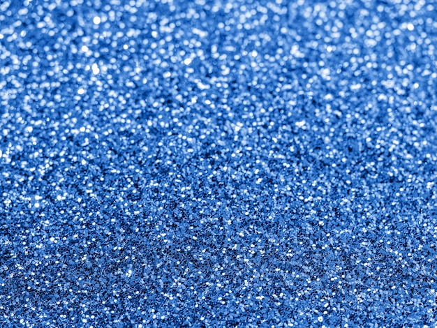 Sprankelende achtergrond met bokeh gemaakt van Classic Blue 2020-kleur.