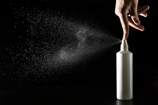 Spray bottle with hand
