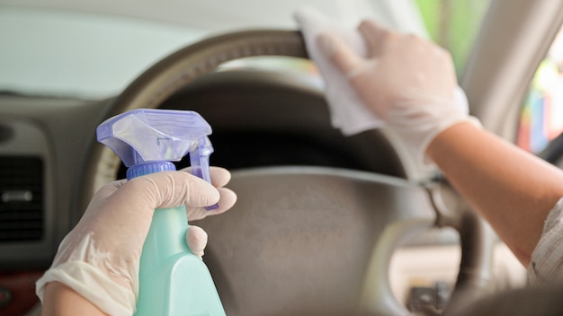 Spray to clean and disinfect the steering wheel and inside the car