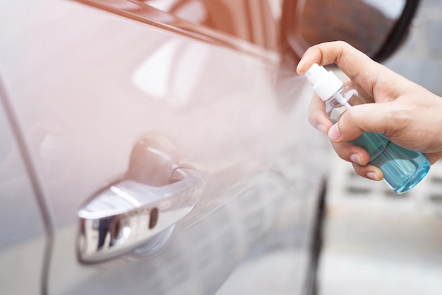 Photo spray cleaning car to protect against corona virus