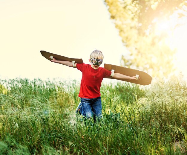 Spread your wings and fly Shot of a little boy pretending to fly outside