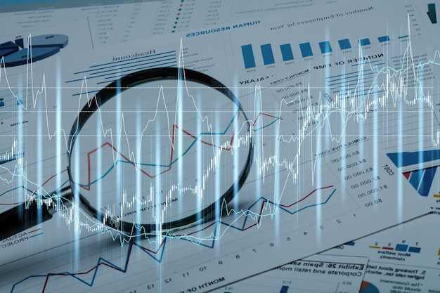 Spreadsheet bank accounts accounting with calculator and magnifying glass.