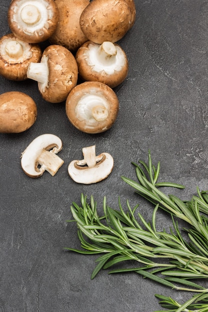 Sprig of rosemary and champignons