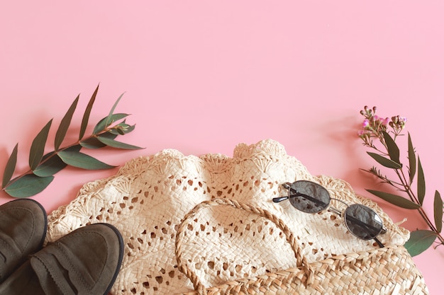 Spring Accessories and Clothes on a pink wall